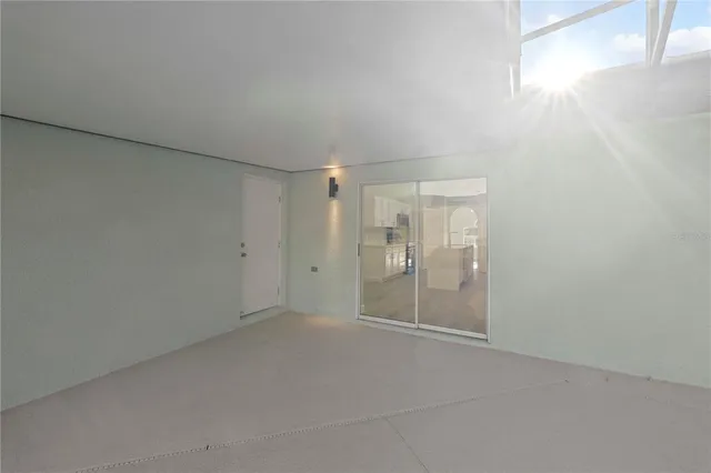 a view of a swimming pool with a yard