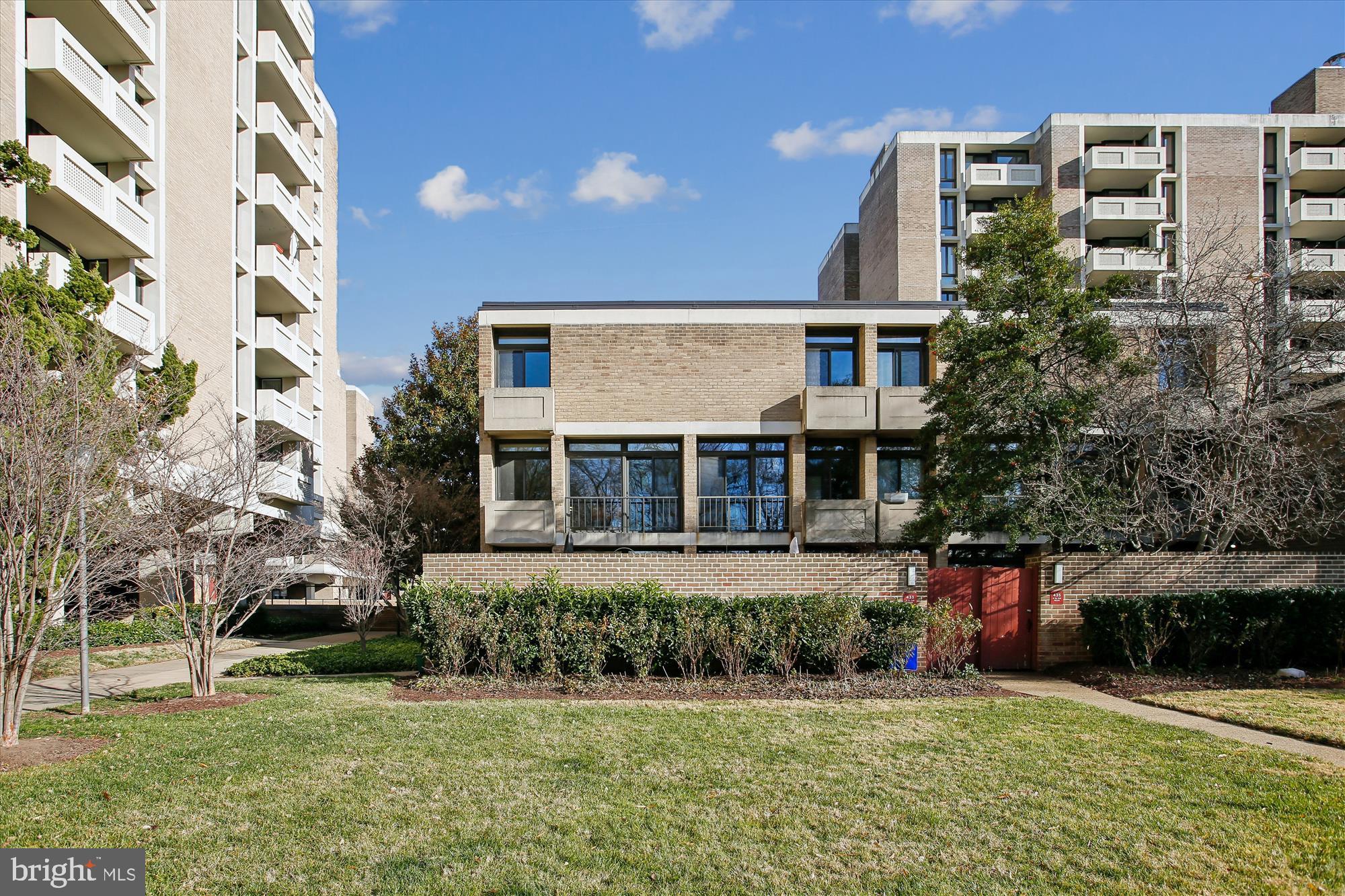 Modern architecture amidst lush greenery.