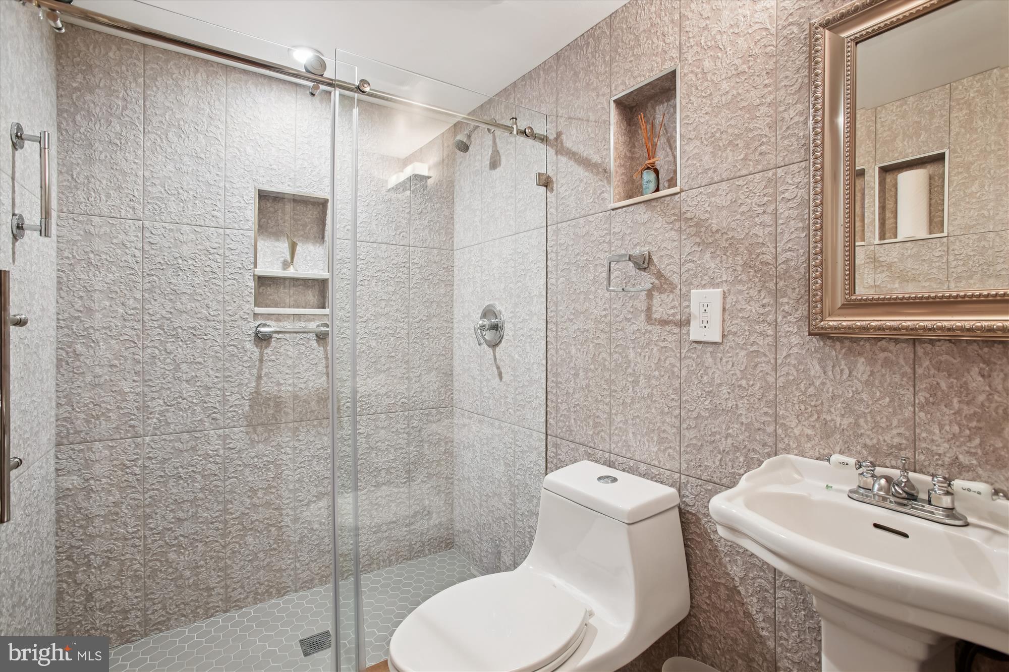 431 N Street Southwest Washington, DC 20024 - Photo 16 of 101 Sleek modern bathroom with elegant finishes.