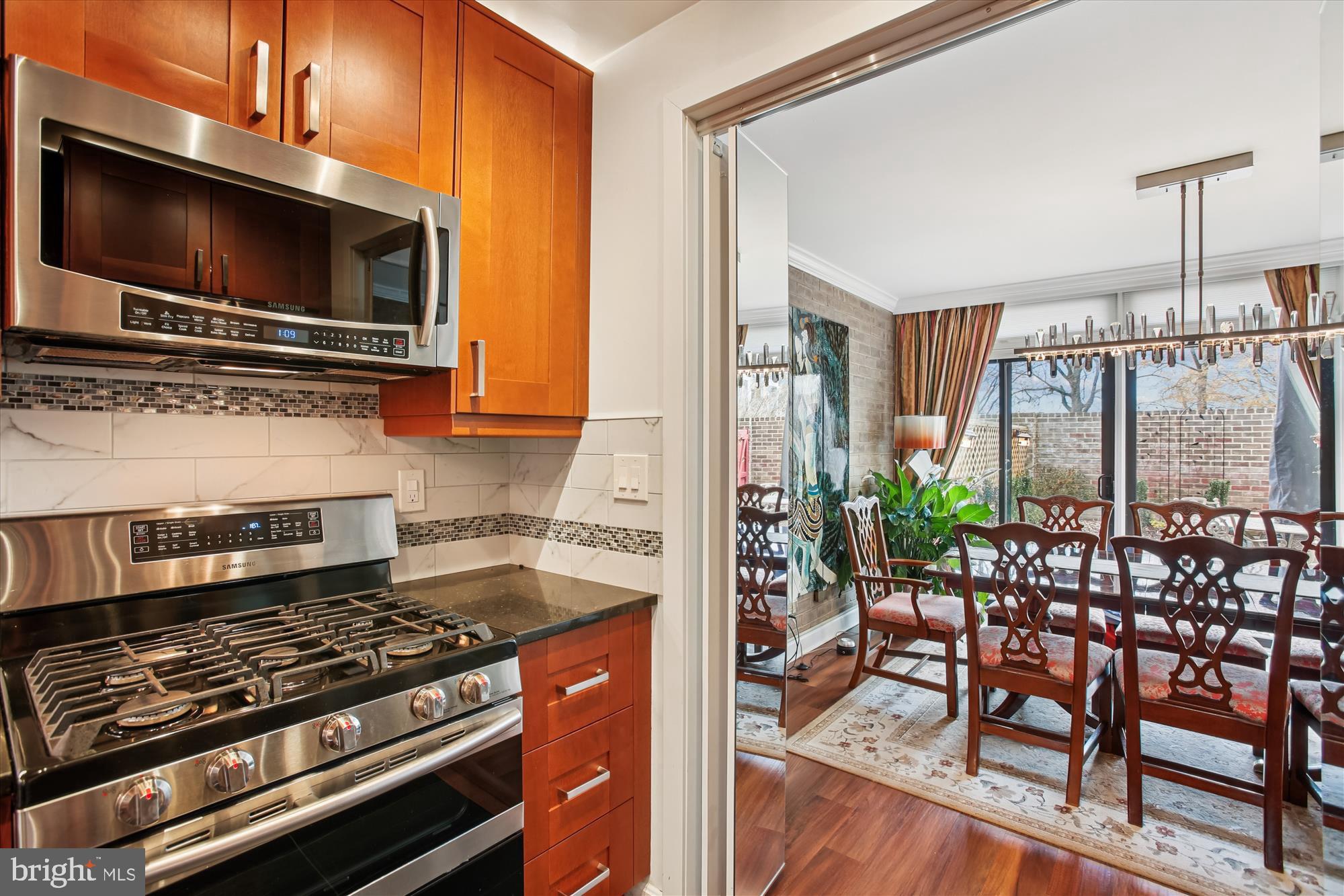 431 N Street Southwest Washington, DC 20024 - Photo 27 of 101 Modern kitchen flows into elegant dining area.