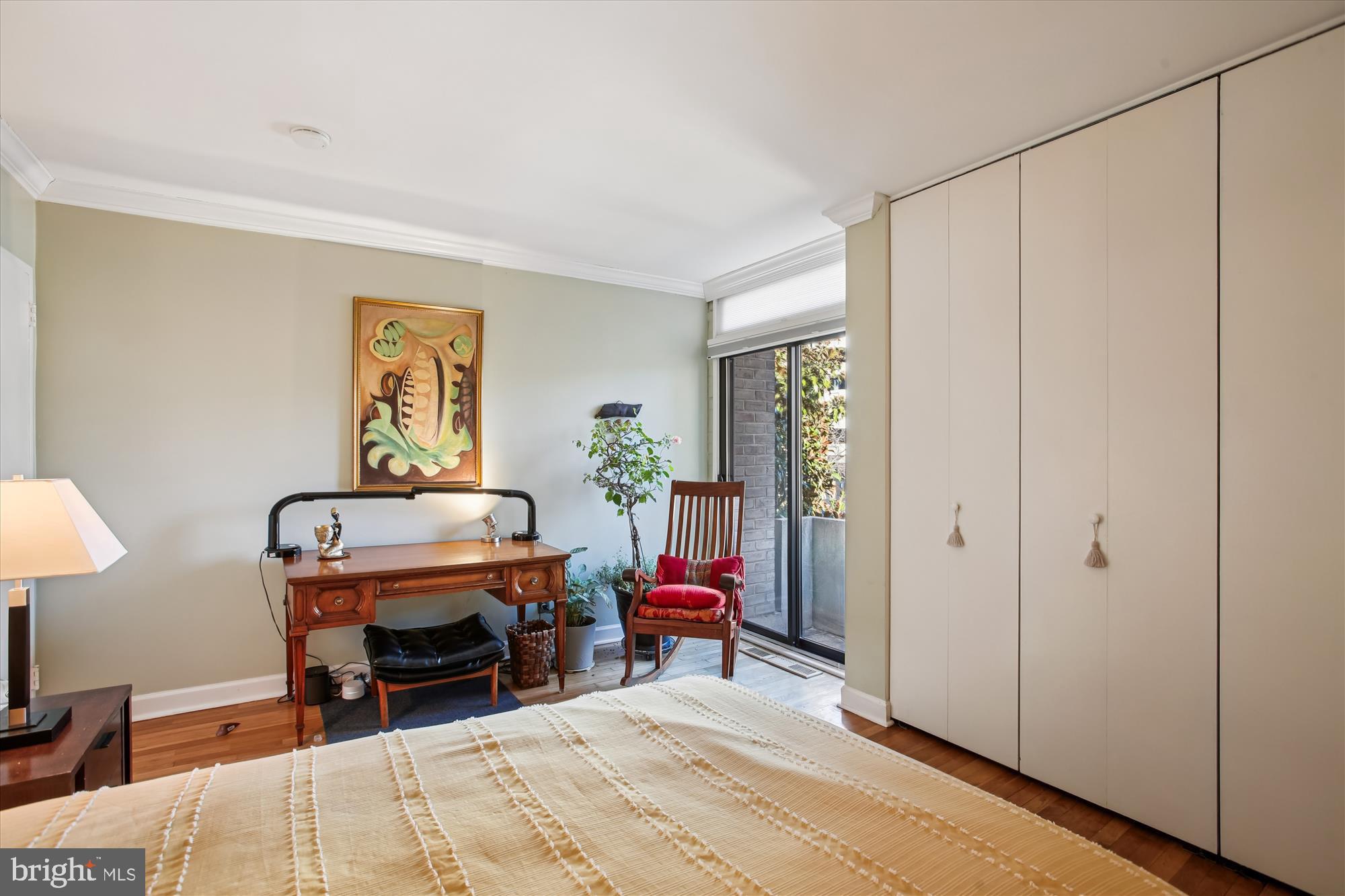 431 N Street Southwest Washington, DC 20024 - Photo 40 of 101 Serene bedroom with natural light and art.
