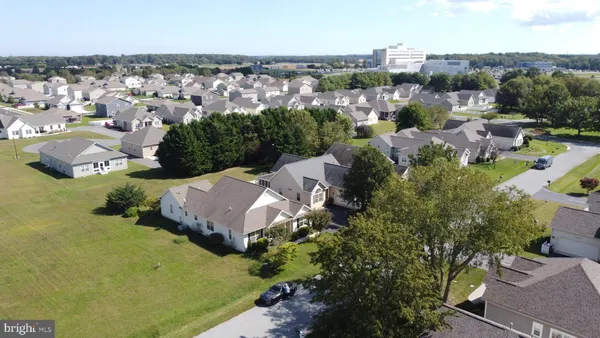 an aerial view of a house with a garden
