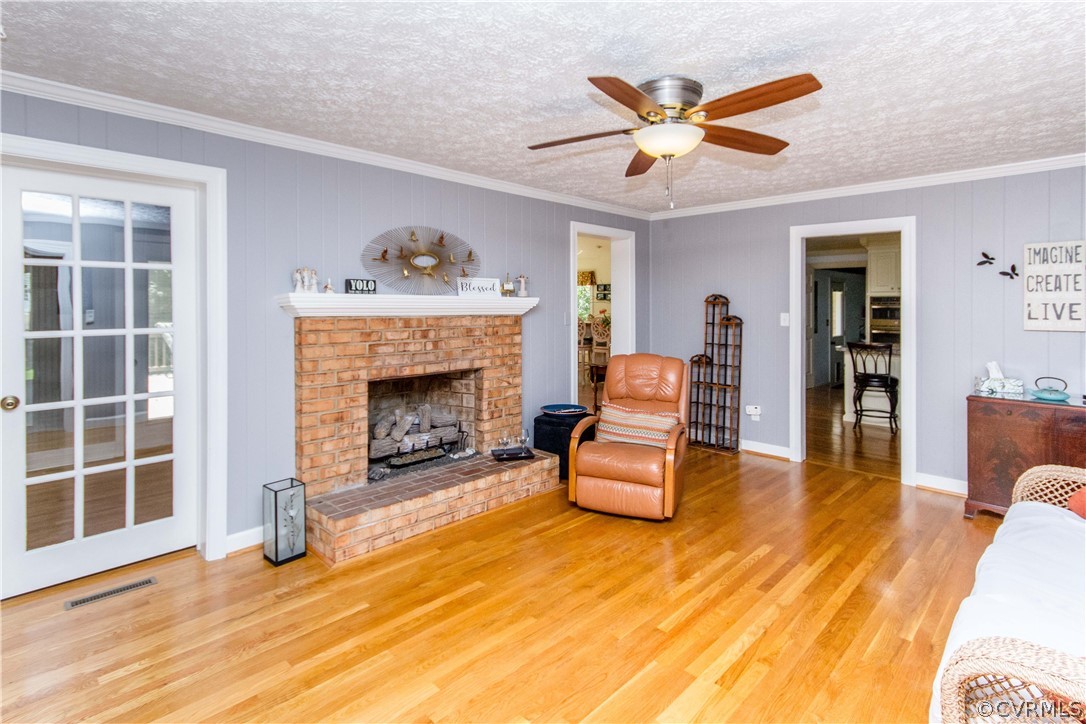 4017 Hidden Valley Road Chester, VA 23831 - Photo 11 of 50 a living room with furniture and a fireplace