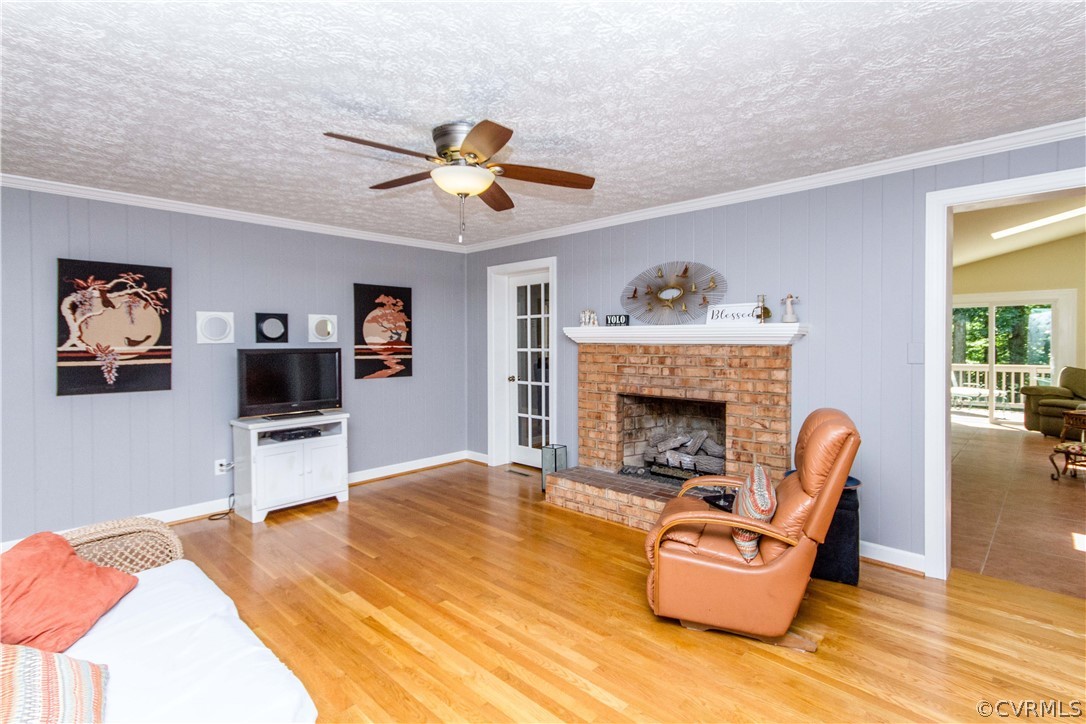 4017 Hidden Valley Road Chester, VA 23831 - Photo 13 of 50 a living room with furniture and a fireplace