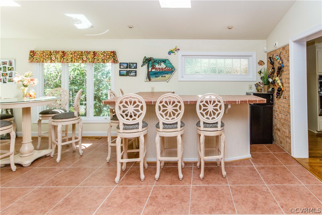 4017 Hidden Valley Road Chester, VA 23831 - Photo 15 of 50 a view of a dining room with furniture window and outside view