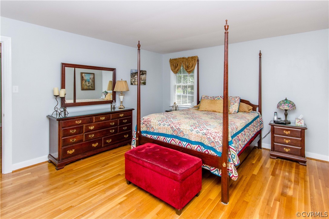 4017 Hidden Valley Road Chester, VA 23831 - Photo 19 of 50 a bedroom with a bed and a dresser