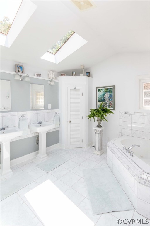 4017 Hidden Valley Road Chester, VA 23831 - Photo 24 of 50 a spacious en suite bathroom with a tub double vanity and mirror
