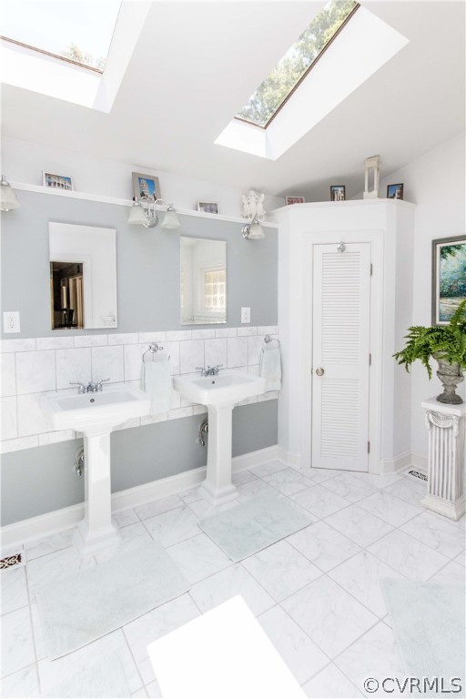 4017 Hidden Valley Road Chester, VA 23831 - Photo 26 of 50 a bathroom with a tub a sink and mirror