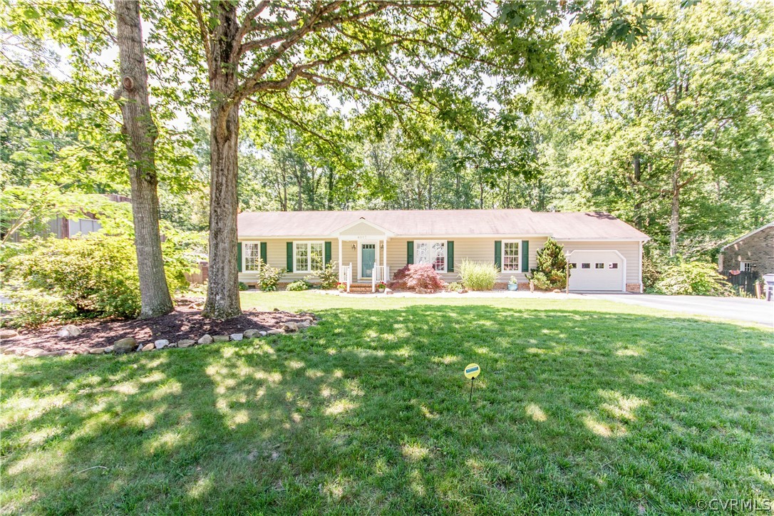 4017 Hidden Valley Road Chester, VA 23831 - Photo 3 of 50 a front view of a house with a garden