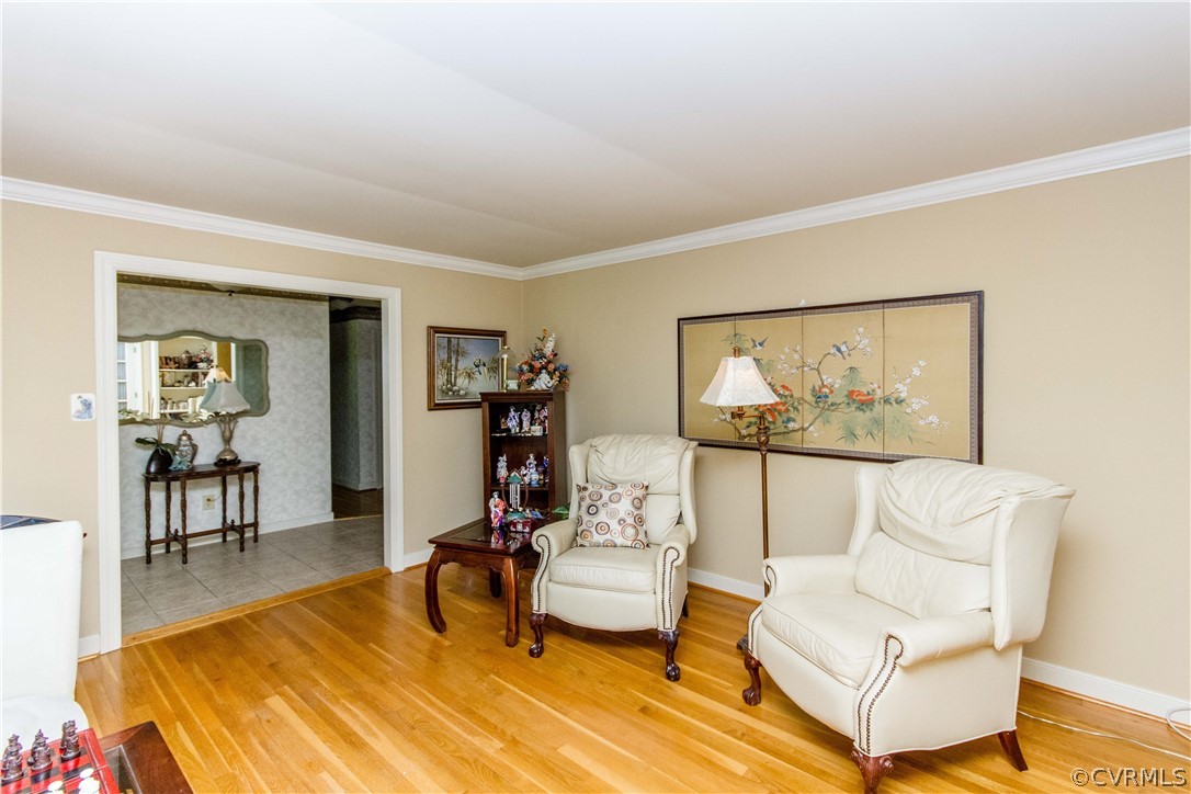 4017 Hidden Valley Road Chester, VA 23831 - Photo 6 of 50 a living room with furniture a wooden floor and a table