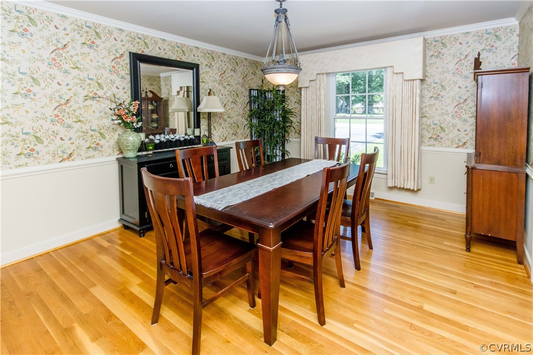 4017 Hidden Valley Road Chester, VA 23831 - Photo 7 of 50 a view of a dining room with furniture and wooden floor
