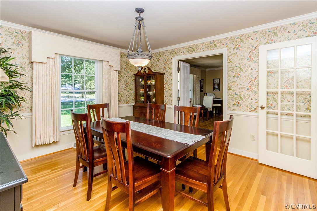 4017 Hidden Valley Road Chester, VA 23831 - Photo 8 of 50 a view of a dining room with furniture window and wooden floor