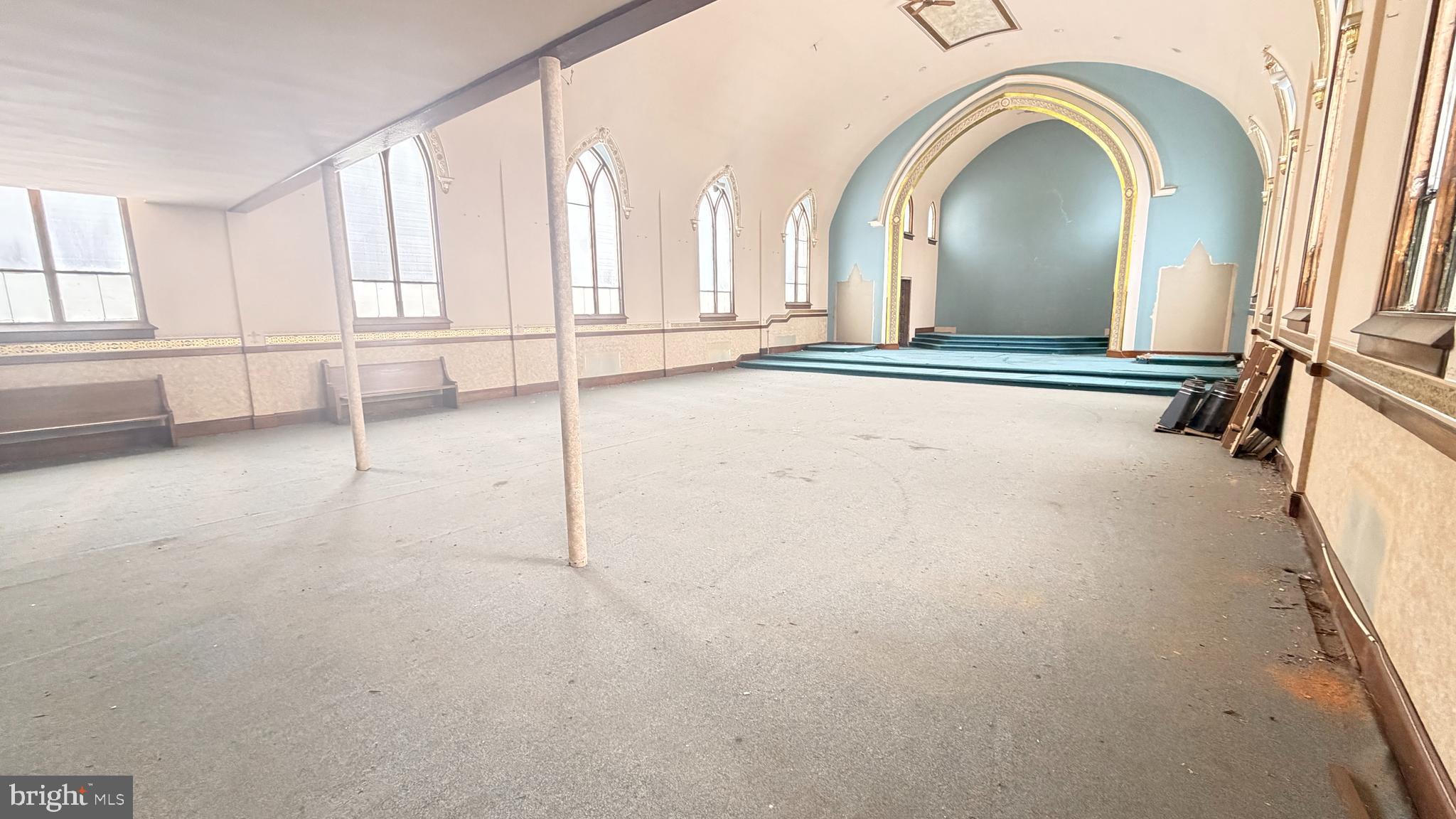 300 Vandermark Road Nanticoke, PA 18634 - Photo 8 of 22 an empty room with windows