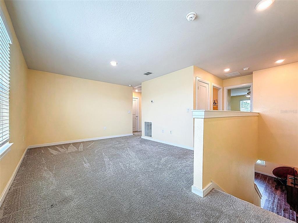 9324 Rally Spring Loop Wesley Chapel, FL 33545 - Photo 24 of 57 a view of livingroom with furniture
