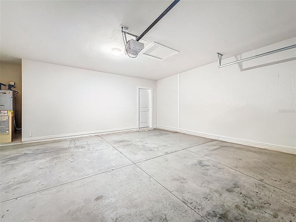 9324 Rally Spring Loop Wesley Chapel, FL 33545 - Photo 42 of 57 a view of an empty room