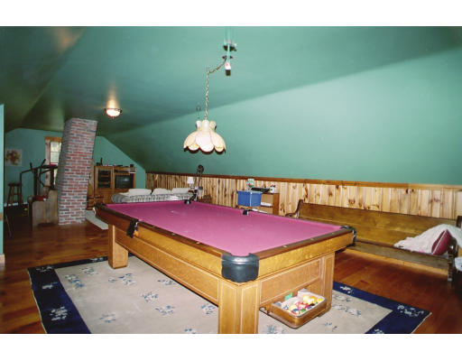 409 Pepperell Road Groton, MA 01450 - Photo 23 of 28 a view of a room with furniture and wooden floor