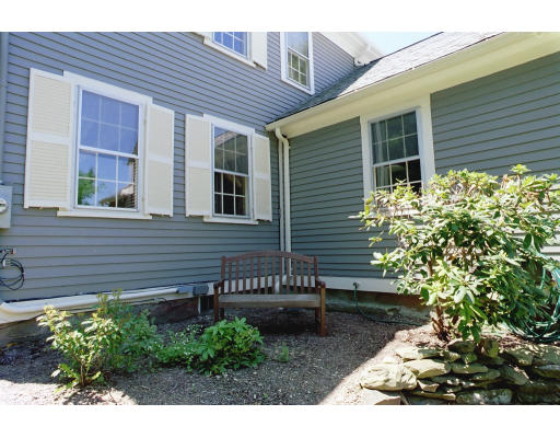 409 Pepperell Road Groton, MA 01450 - Photo 28 of 28 a view of a house with a yard