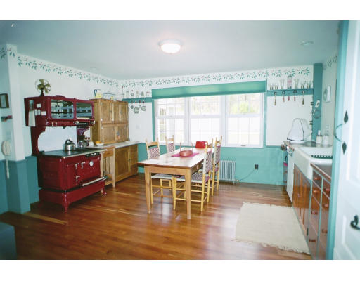 409 Pepperell Road Groton, MA 01450 - Photo 7 of 28 a living room with furniture and a large window