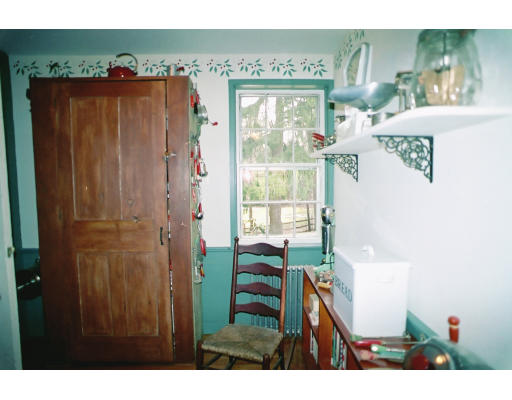 409 Pepperell Road Groton, MA 01450 - Photo 8 of 28 a living room with furniture and a window