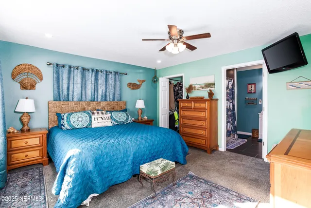 a bedroom with a bed and furniture