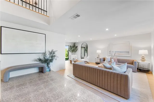 a view of bedroom with furniture and staircase