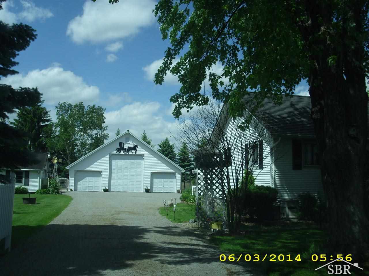 5929 Hess Road Saginaw, MI 48601 - Photo 12 of 12 If you enjoy being in your yard, this one is exceptional. Neat and clean buildings. Lots of room and tons of trees and flowers, plus garden area.