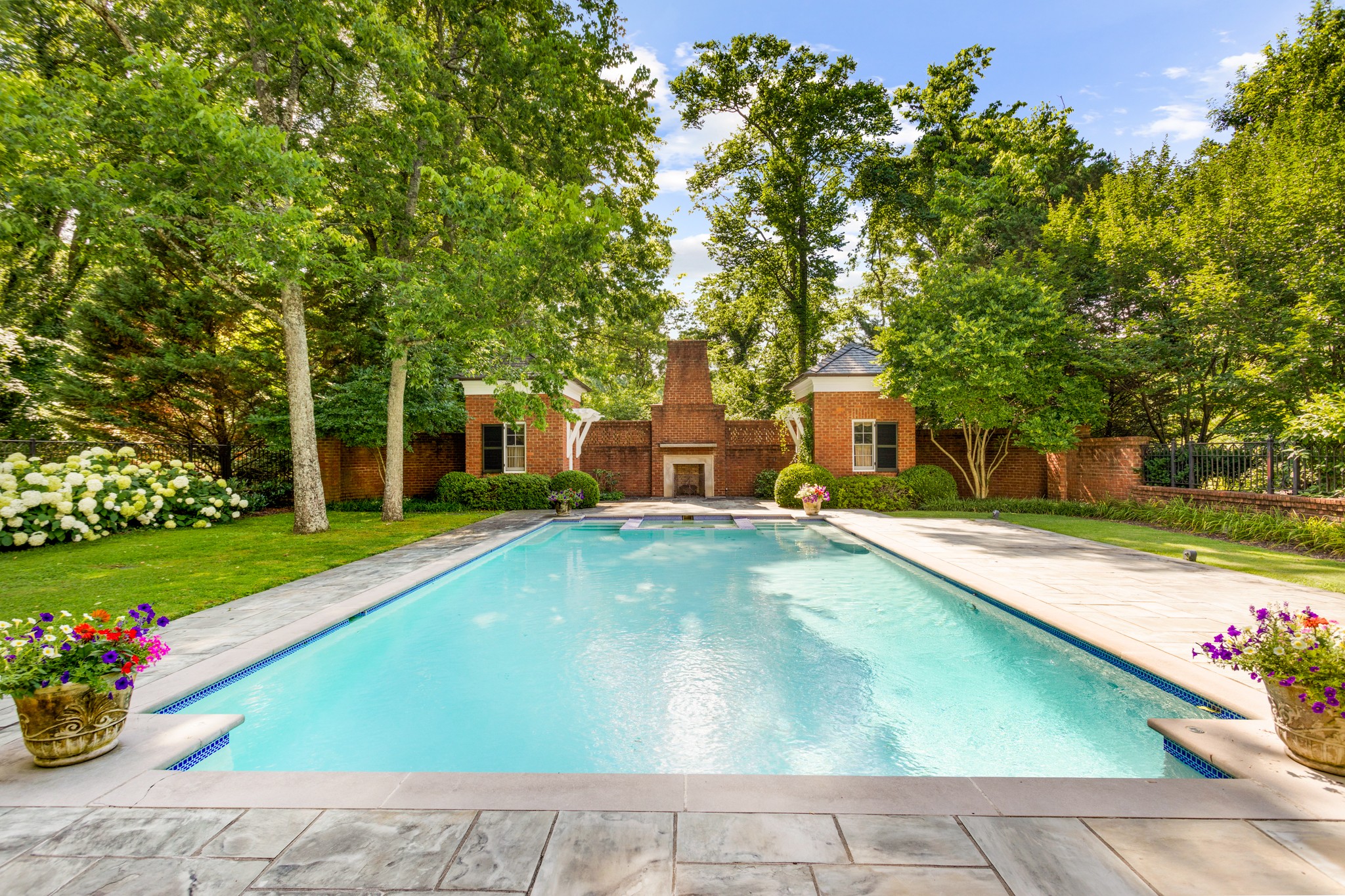 907 Overton Lea Road Nashville, TN 37220 - Photo 18 of 24 a swimming pool with outdoor seating and yard