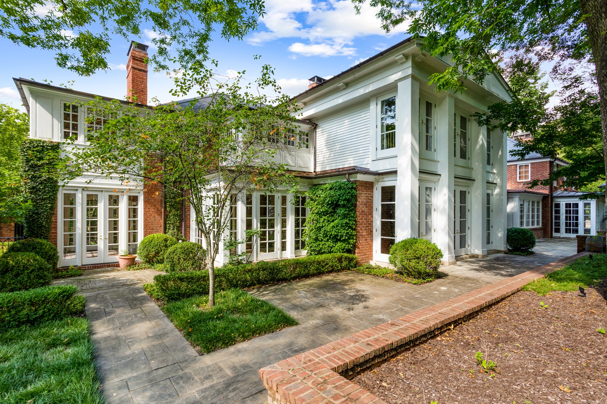 907 Overton Lea Road Nashville, TN 37220 - Photo 20 of 24 front view of a house with a yard