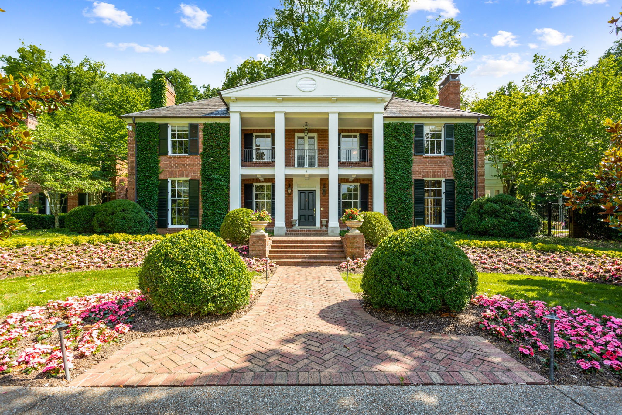 907 Overton Lea Road Nashville, TN 37220 - Photo 3 of 24 front view of a house with a yard