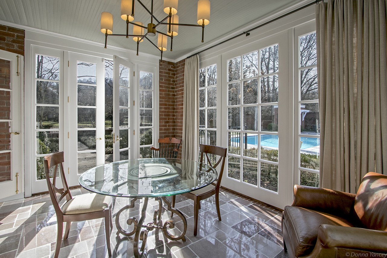 907 Overton Lea Road Nashville, TN 37220 - Photo 8 of 24 a view of a dining room with furniture window and outside view