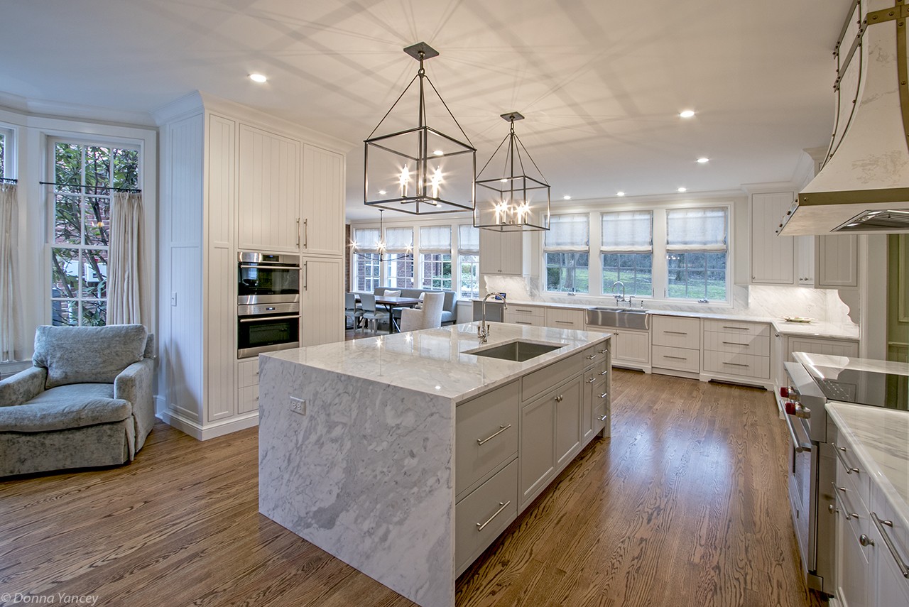 907 Overton Lea Road Nashville, TN 37220 - Photo 10 of 24 a kitchen with stainless steel appliances granite countertop a sink stove and wooden floor