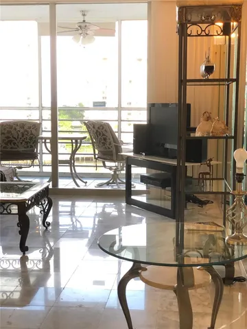 a bedroom with bed and window