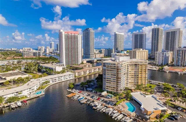 a view of a balcony with outdoor seating