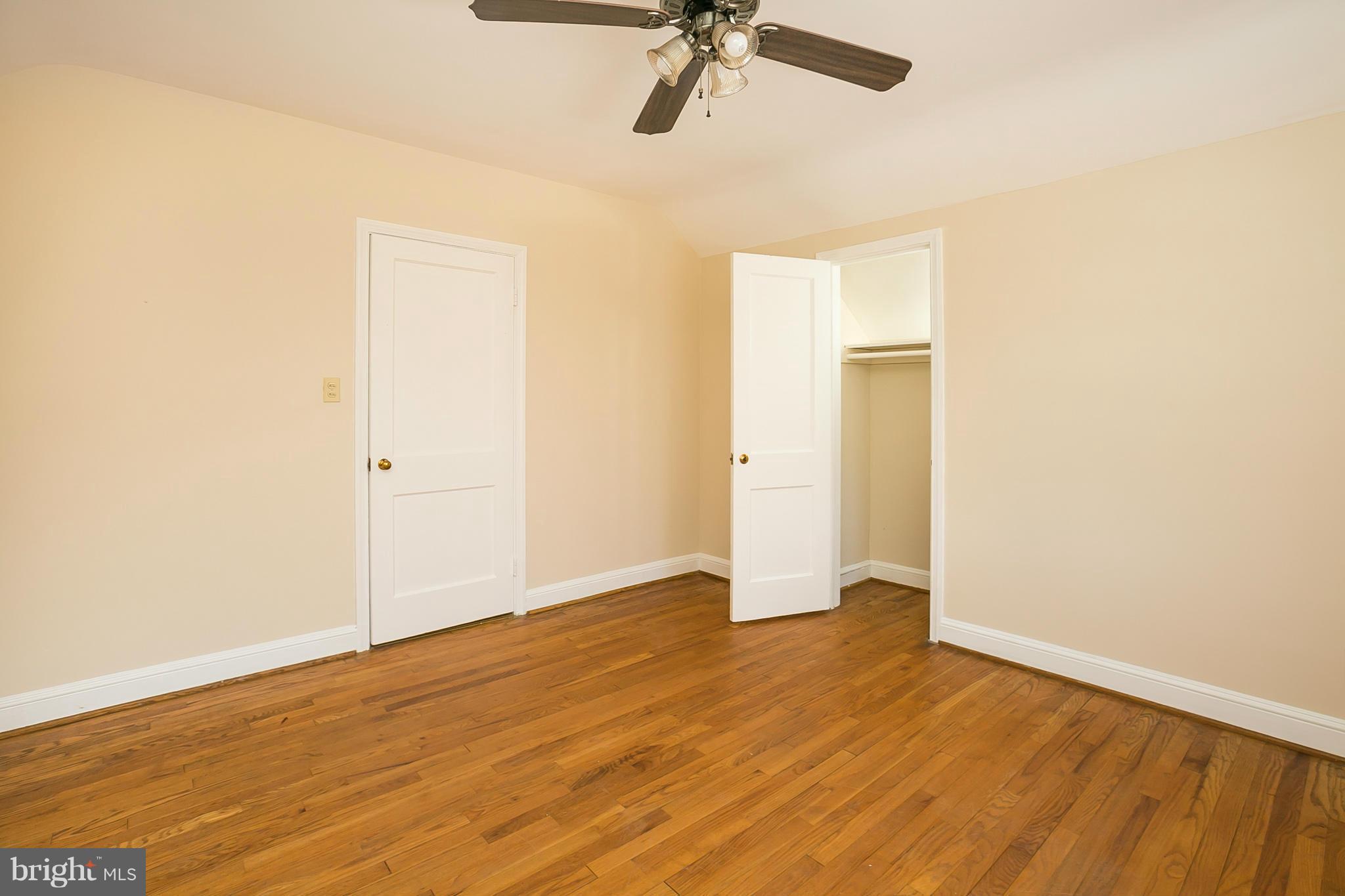 3301 Marnat Road Baltimore, MD 21208 - Photo 16 of 27 a view of an empty room with wooden floor