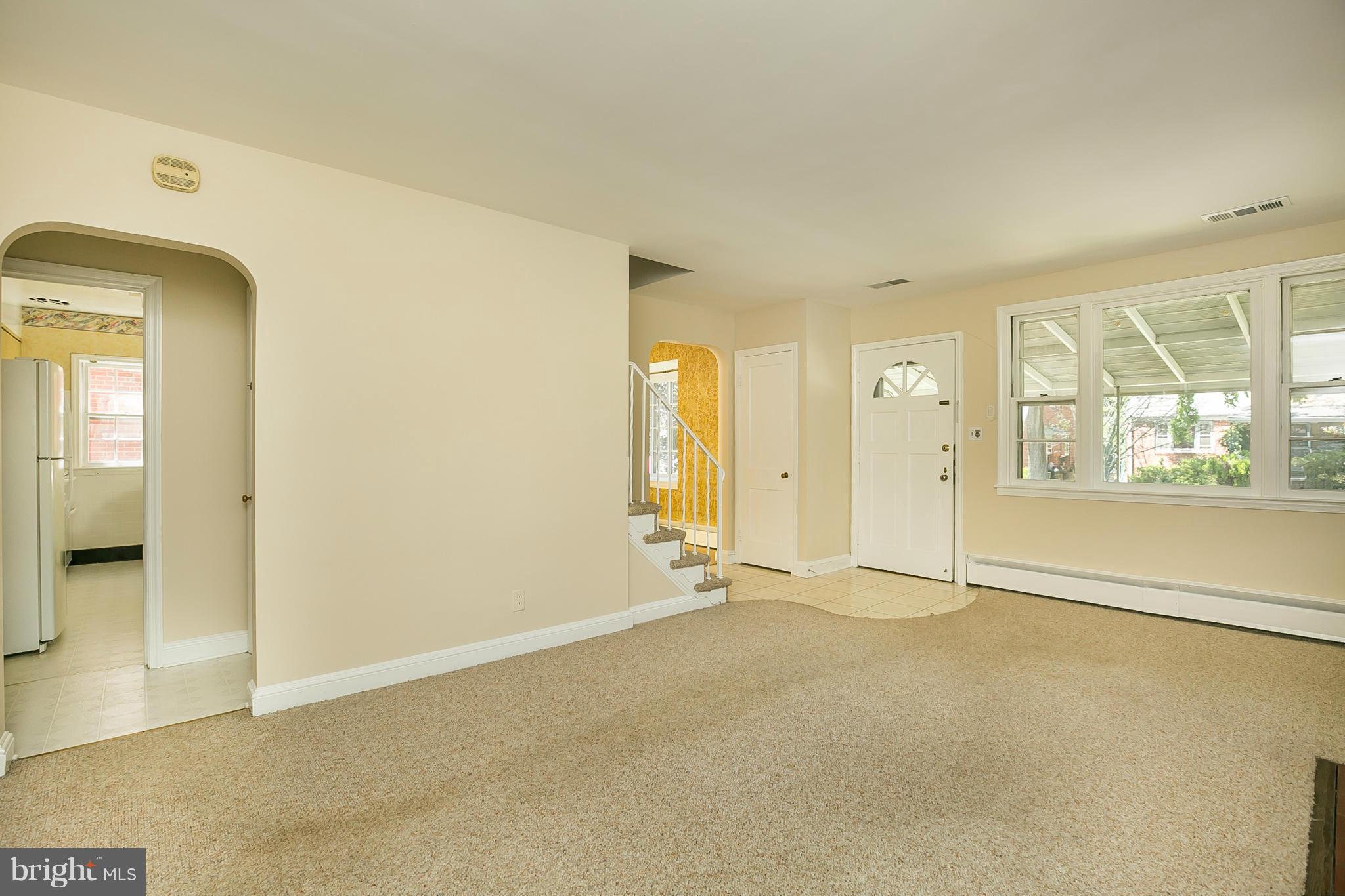 3301 Marnat Road Baltimore, MD 21208 - Photo 3 of 27 an empty room with window