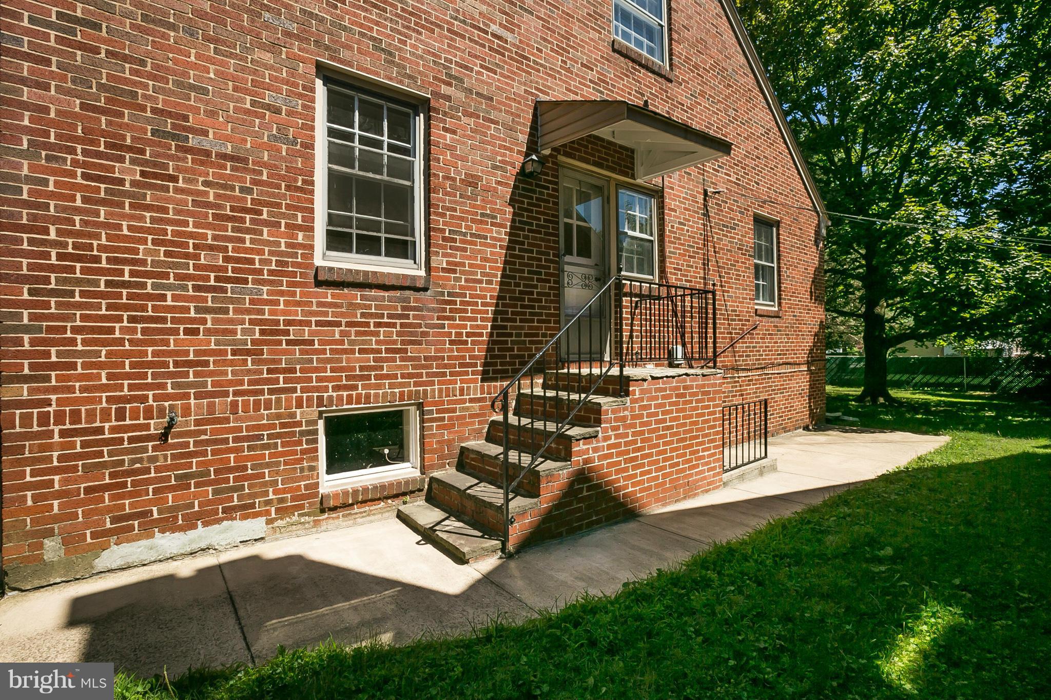 3301 Marnat Road Baltimore, MD 21208 - Photo 23 of 27 a view of house with backyard porch and garden