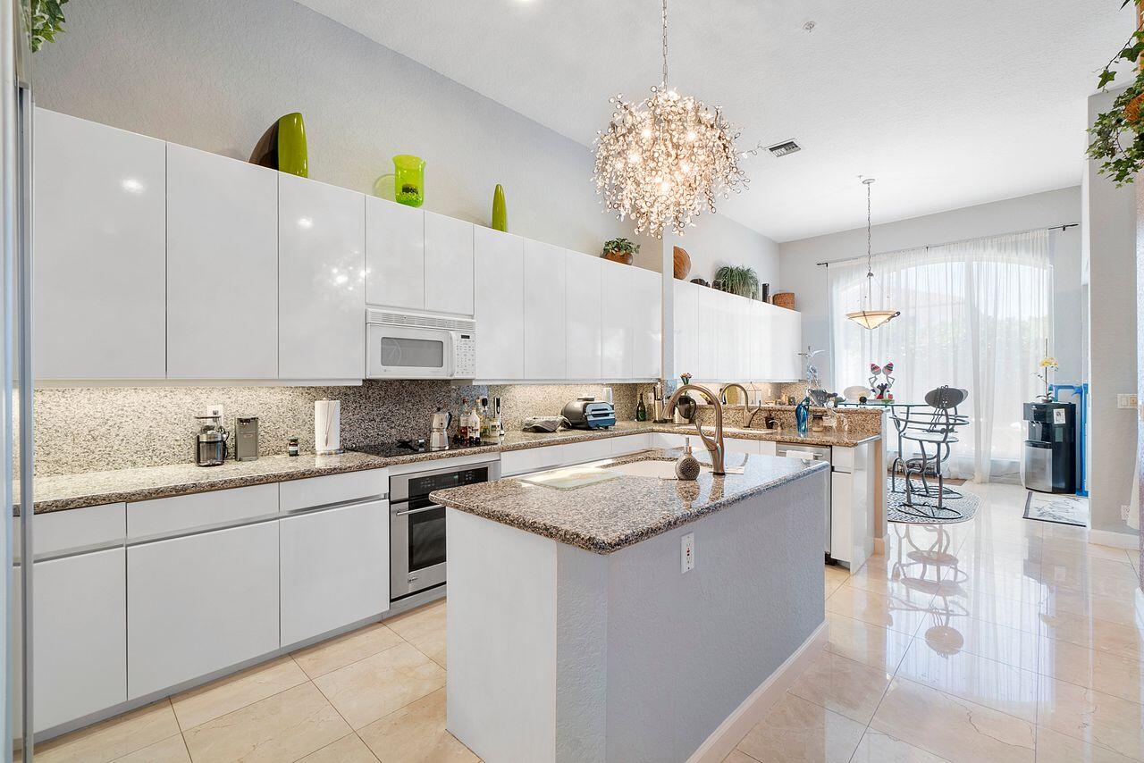 929 Sweetwater Lane Boca Raton, FL 33431 - Photo 9 of 34 DE108780-D5E5-475E-8424-3B6AFA1F3351