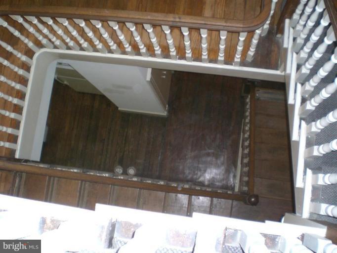 2119 R Street Northwest Washington, DC 20008 - Photo 23 of 30 Oak staircase from top to main floor below.