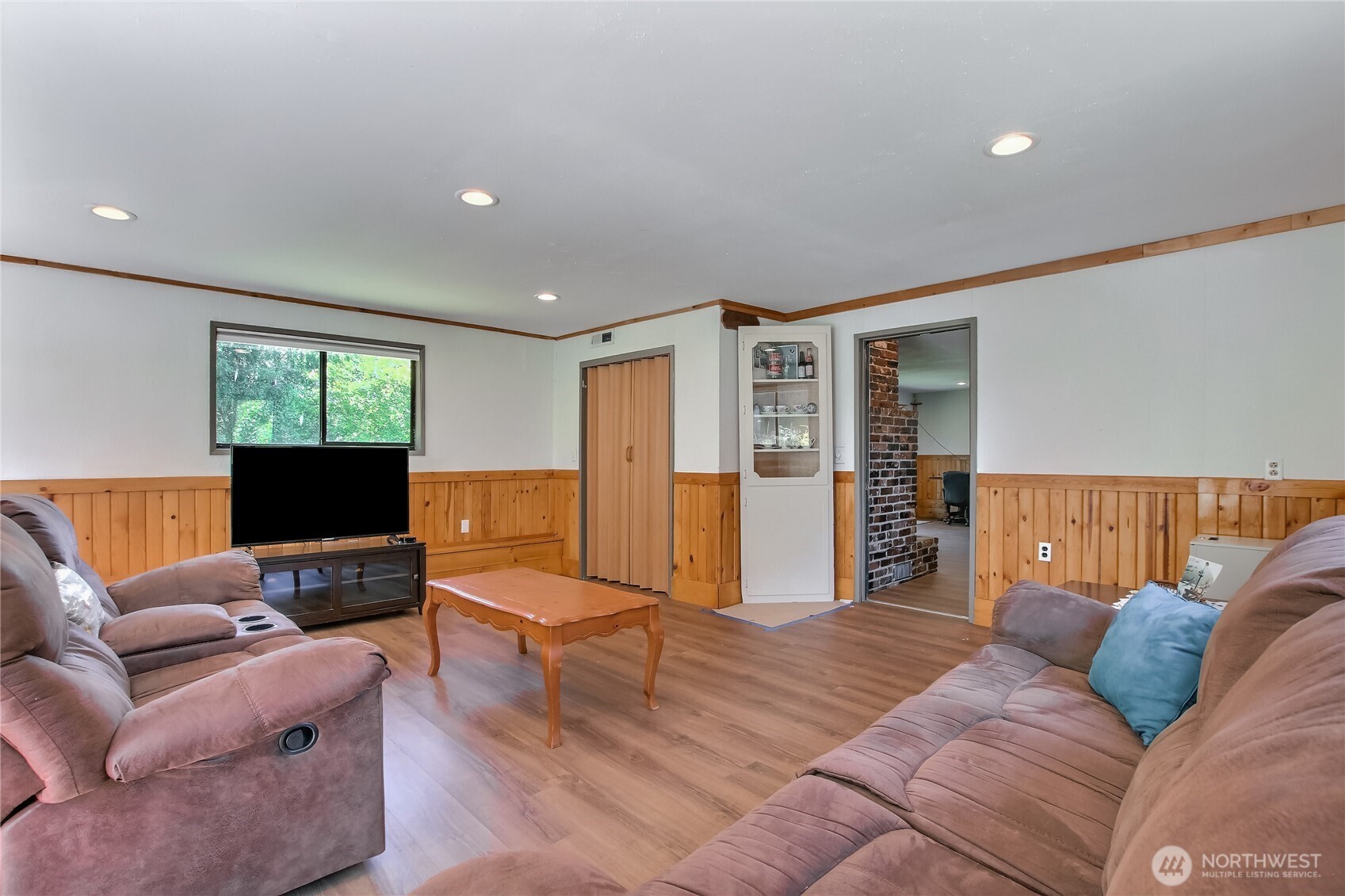 13610 Southeast 288th Street Kent, WA 98042 - Photo 32 of 32 a living room with furniture and a flat screen tv