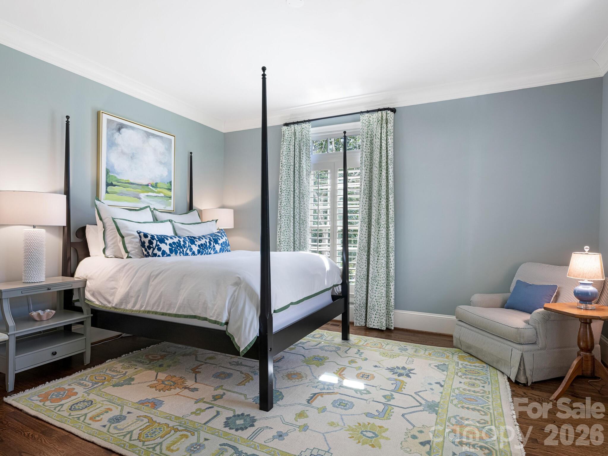 1413 Andover Road Charlotte, NC 28211 - Photo 14 of 41 a bedroom with a bed and wooden floor