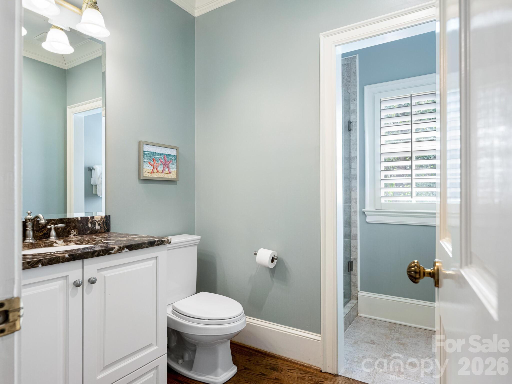 1413 Andover Road Charlotte, NC 28211 - Photo 15 of 41 a bathroom with a sink toilet and shower