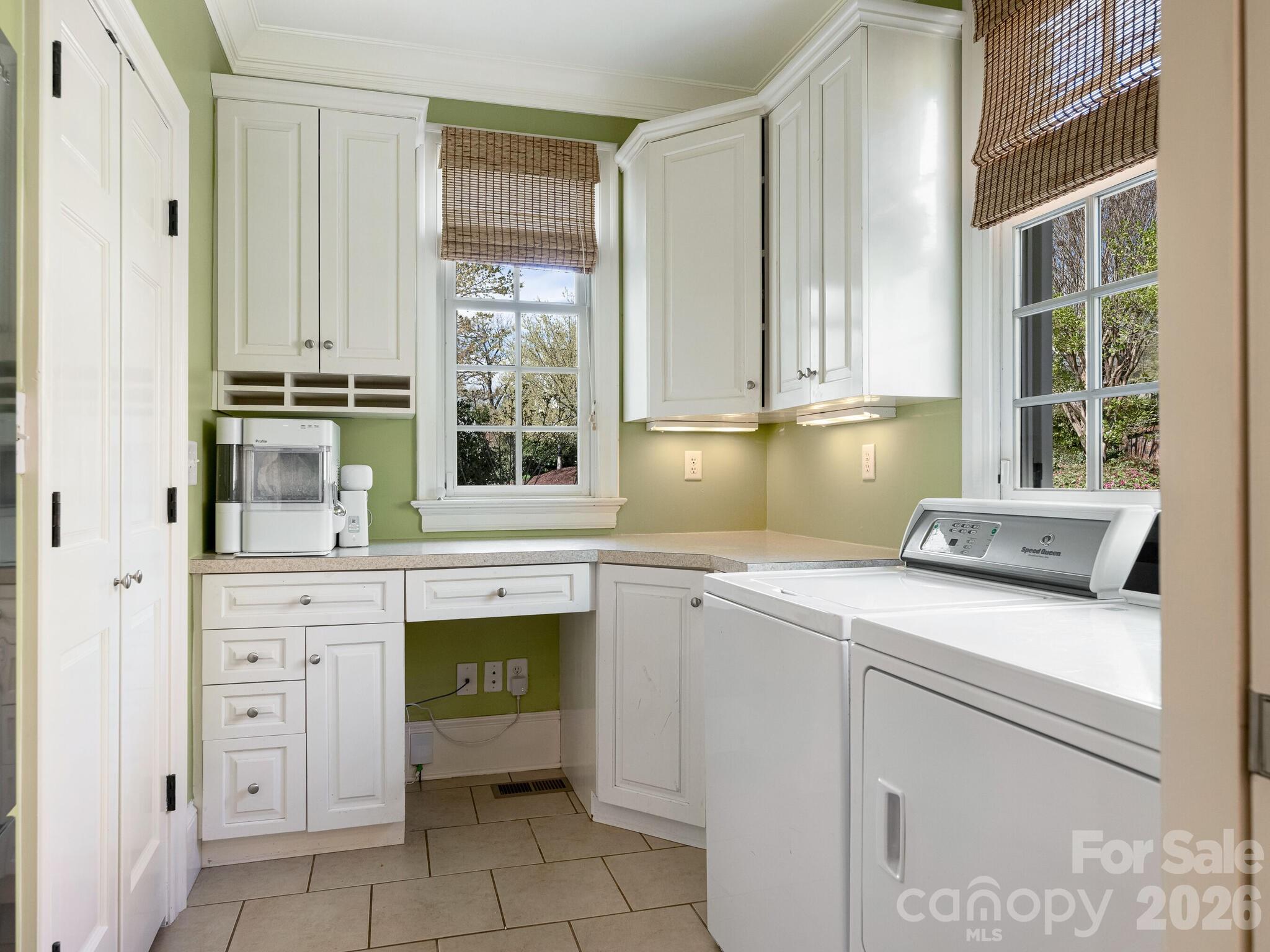 1413 Andover Road Charlotte, NC 28211 - Photo 16 of 41 a kitchen with cabinets appliances and a window