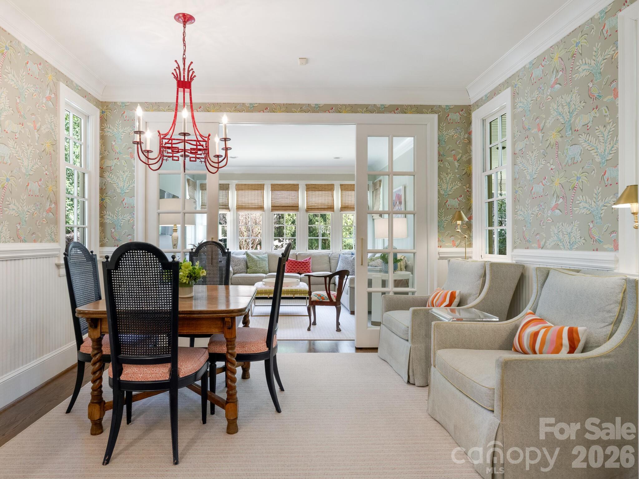 1413 Andover Road Charlotte, NC 28211 - Photo 17 of 41 a living room with furniture and chandelier
