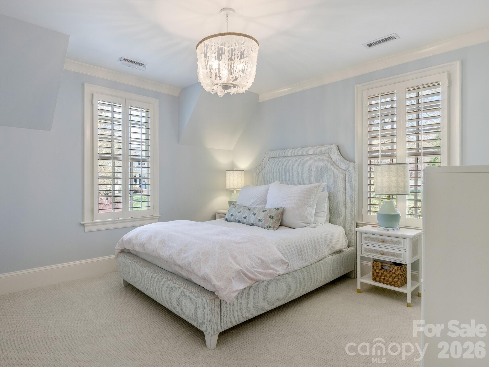 1413 Andover Road Charlotte, NC 28211 - Photo 27 of 41 a bedroom with a bed and a window