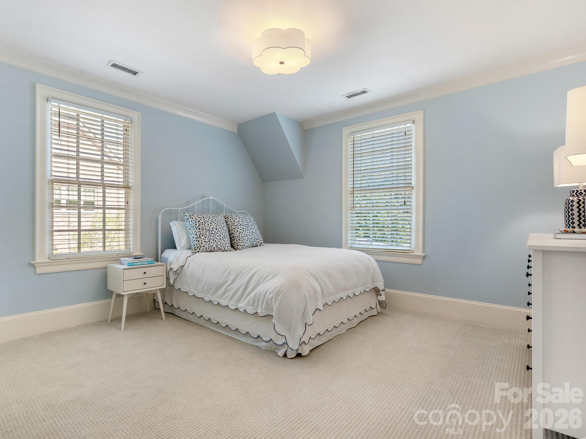 1413 Andover Road Charlotte, NC 28211 - Photo 30 of 41 a spacious bedroom with a bed and a window