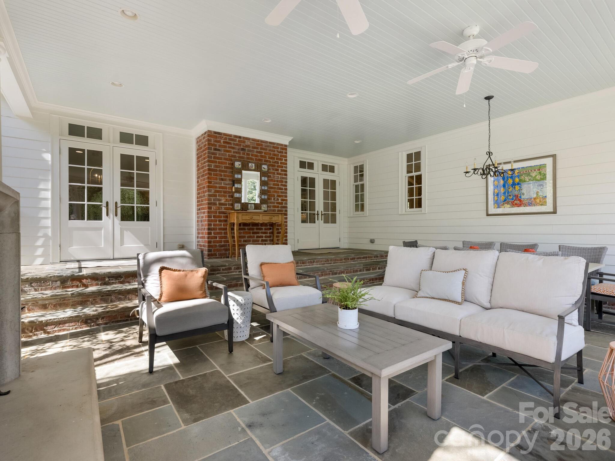 1413 Andover Road Charlotte, NC 28211 - Photo 34 of 41 a living room with furniture and wooden floor
