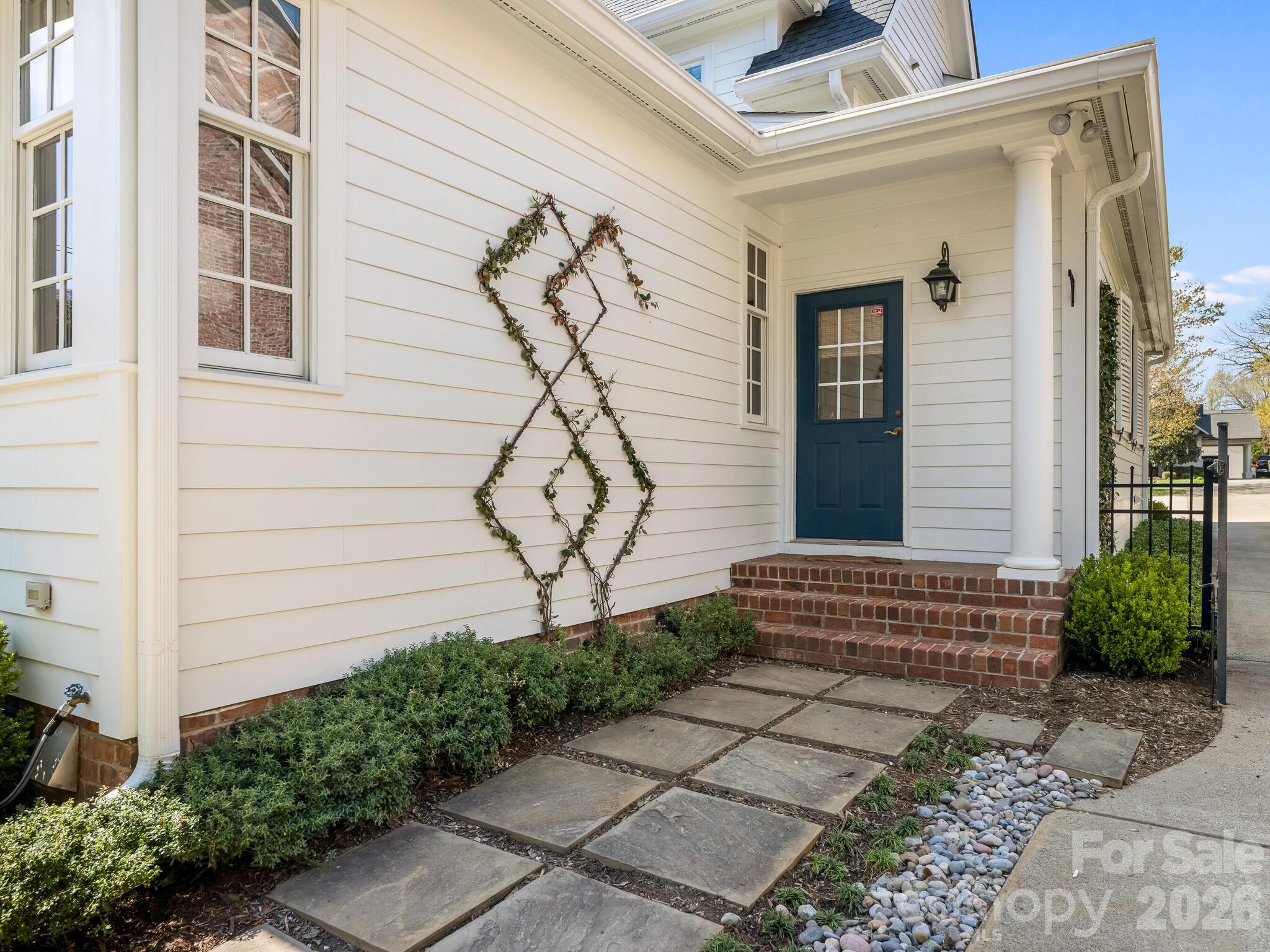 1413 Andover Road Charlotte, NC 28211 - Photo 36 of 41 a front view of a house with garden