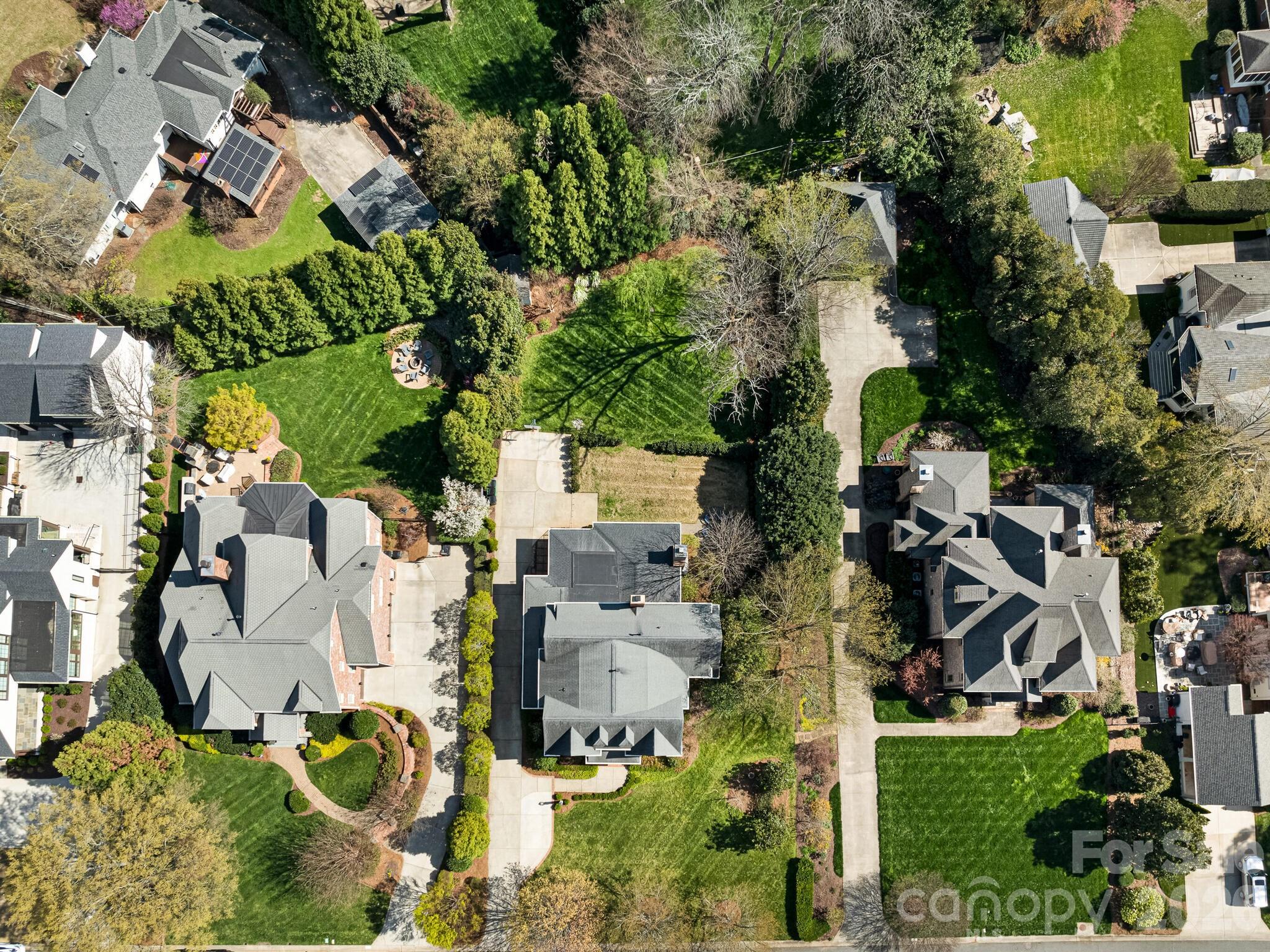 1413 Andover Road Charlotte, NC 28211 - Photo 40 of 41 an aerial view of residential house with outdoor space and parking