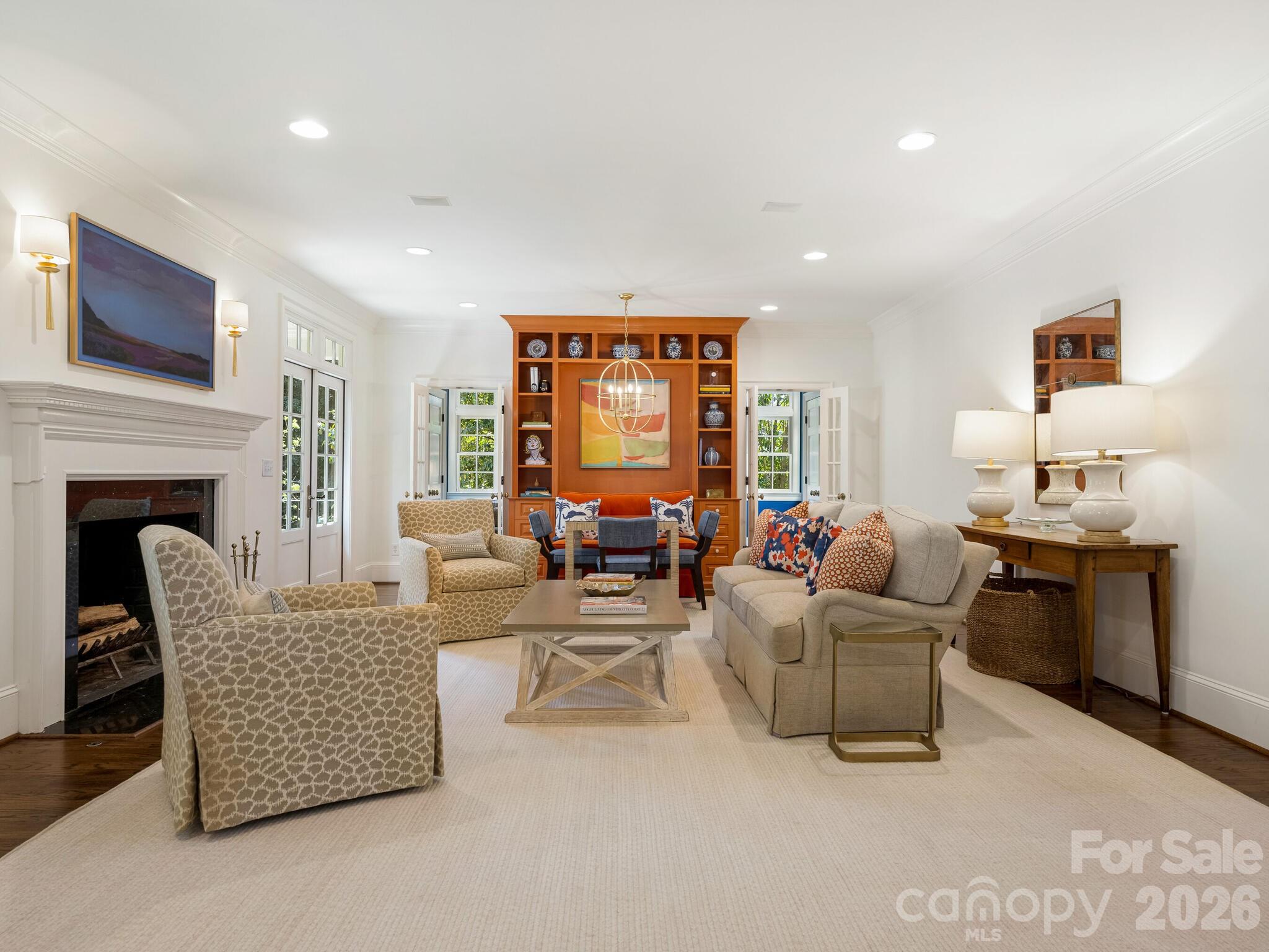 1413 Andover Road Charlotte, NC 28211 - Photo 7 of 41 a living room with fireplace furniture and a flat screen tv