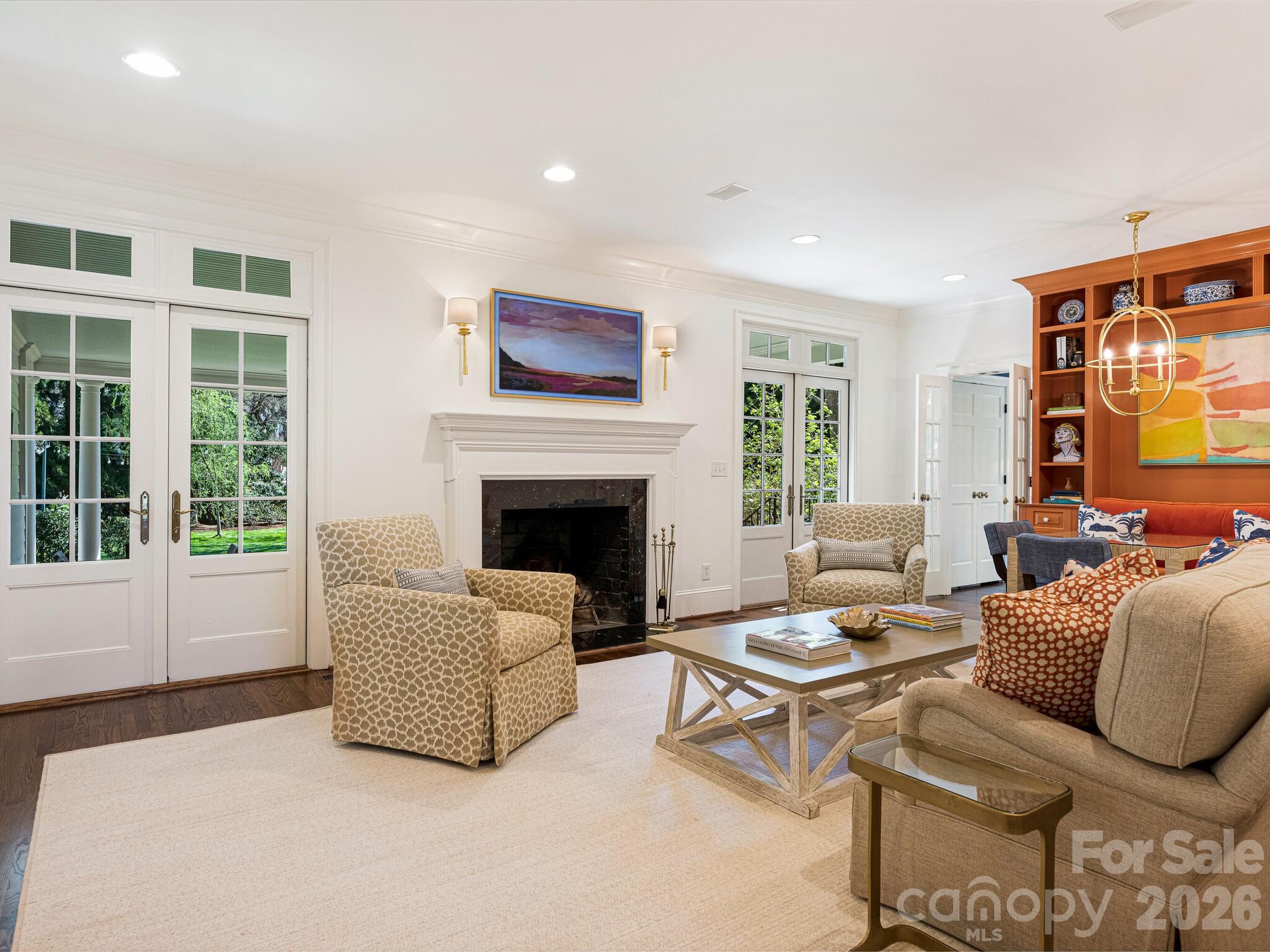 1413 Andover Road Charlotte, NC 28211 - Photo 8 of 41 a living room with furniture and a fireplace